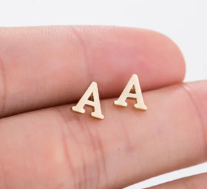 (A) letter earrings